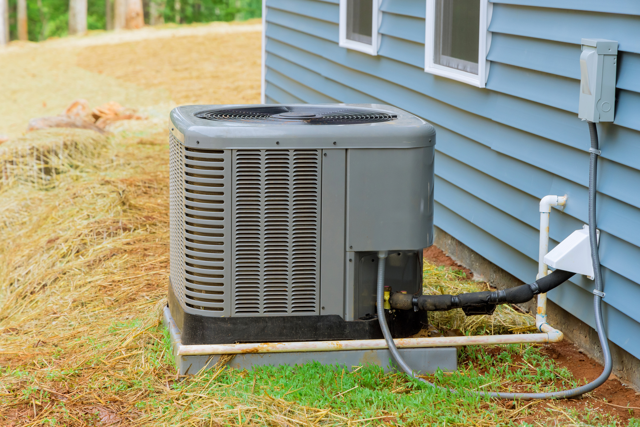 A new air conditioner installed outside a Chicagoland home